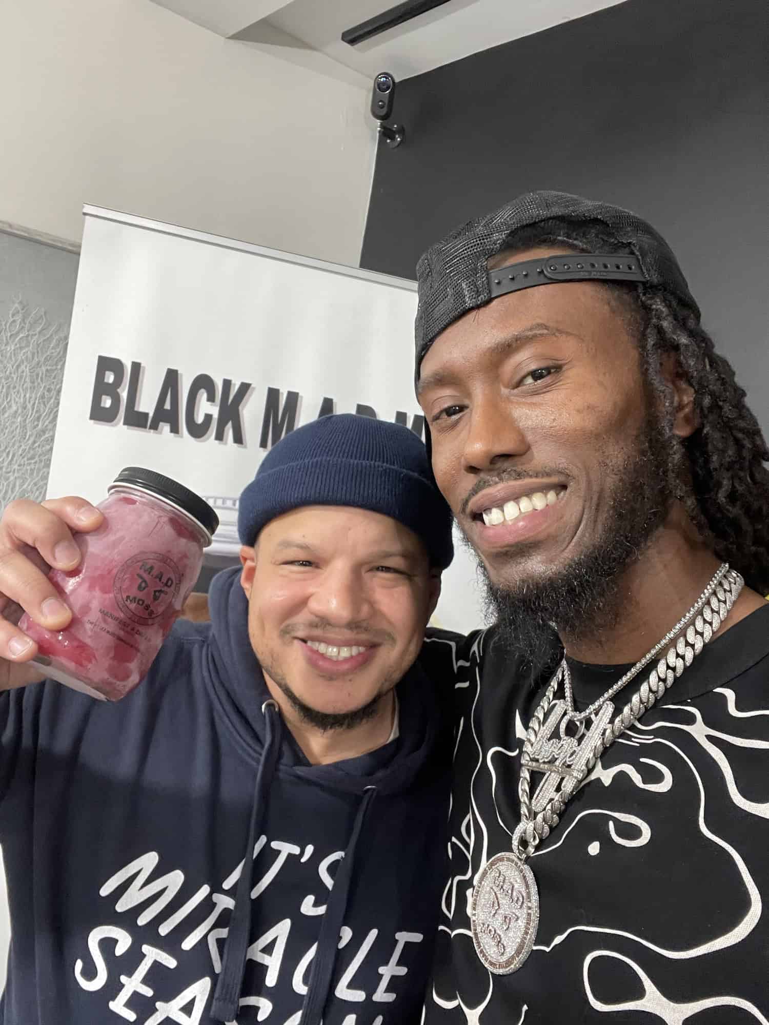 A customer and the M.A.D MO$$ founder at a pop-up event
