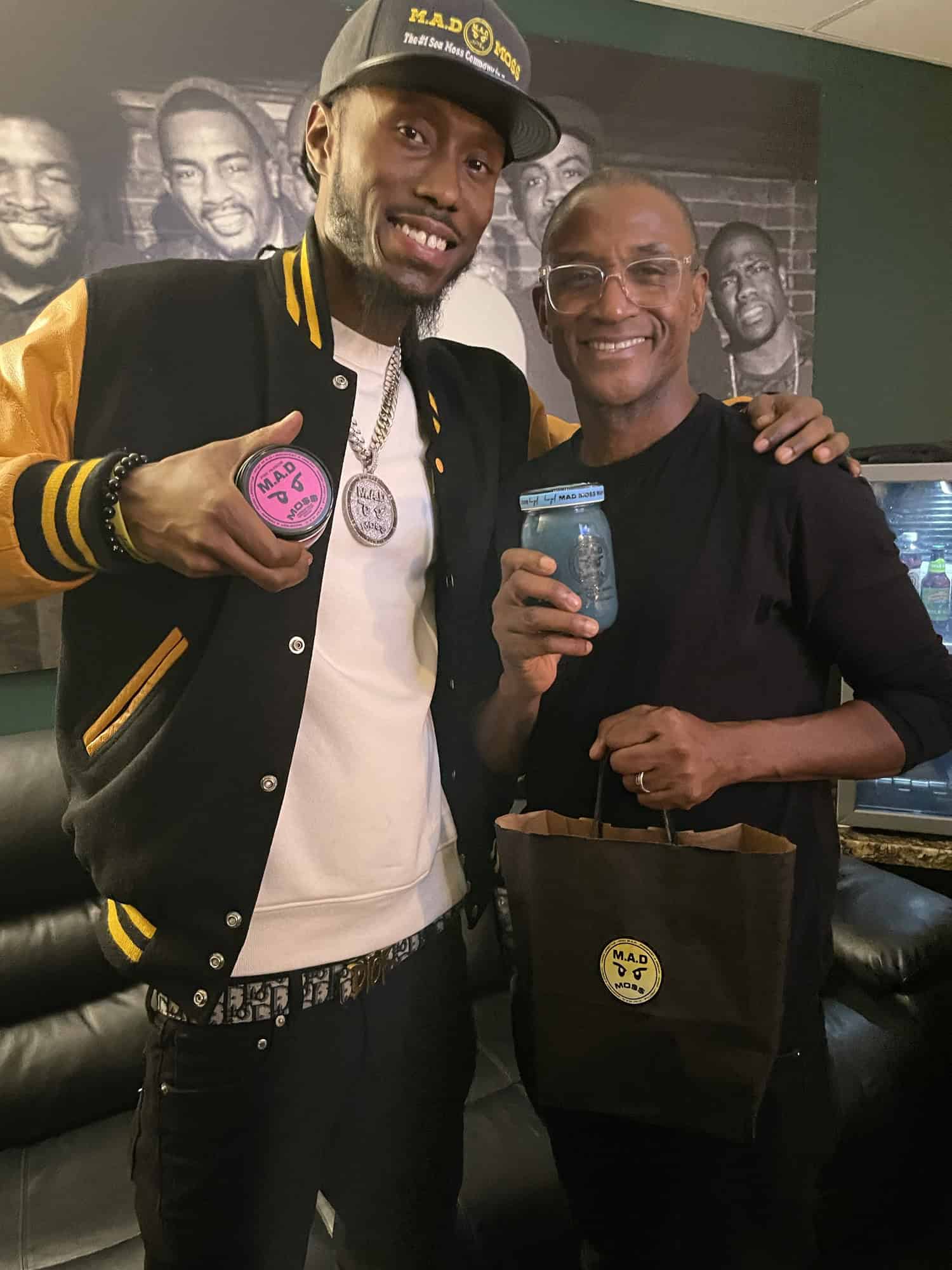 The founder with a supporter at a M.A.D MO$$ pop-up